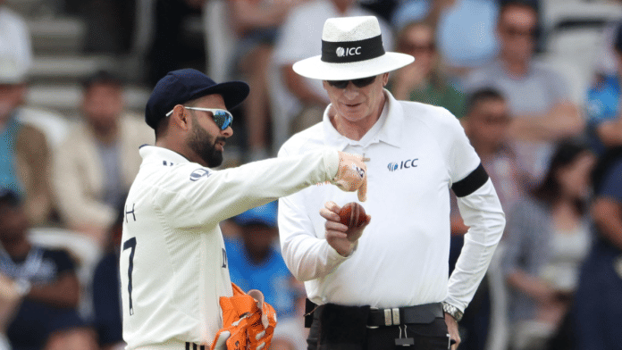 Indian cricketer Rishabh Pant with umpire during England Test series match | X/@cricmawa