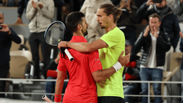 Serbia's Novak Djokovic shakes hands with Germany's Alexander Zverev after winning his quarter final match | Reuters/Gonzalo Fuentes