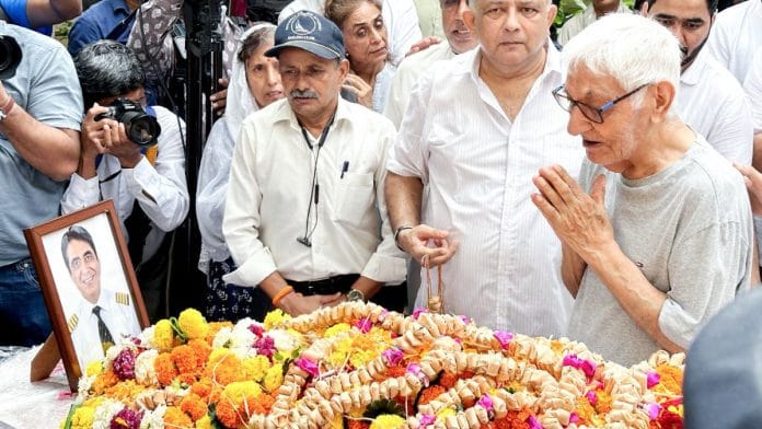 Captain Sumeet Sabharwal's father, Pushkaraj, pays his last respects, outside their residence at Powai in Mumbai, Tuesday. | ANI
