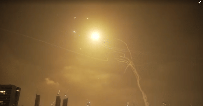 Israeli air defence systems intercepting Iranian ballistic missiles on 13 June, 2025 | Reuters