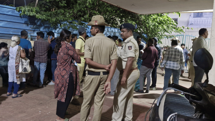 Anxious family and friends wait outside the morgue of Bengaluru's Bowring Hospital | Sharan Poovanna | ThePrint