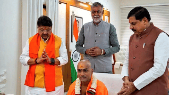Senior BJP leaders from MP, Kailash Vijayvargiya, Prahlad Patel and Mohan Yadav, with Dada Guruji Maharaj (seated) | Insta/dada.guruofficial