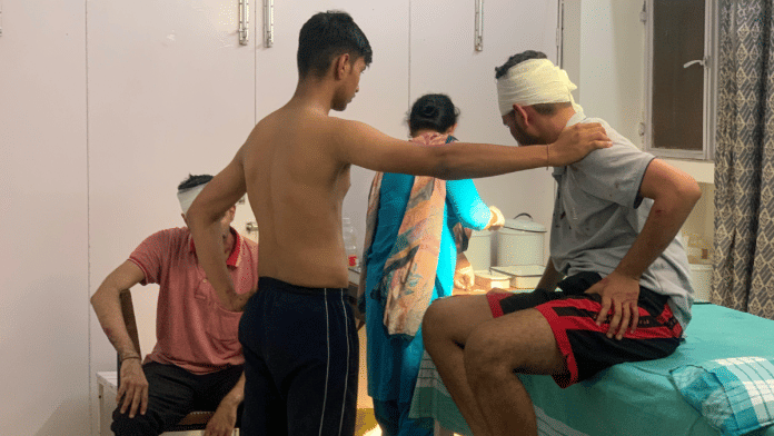 Some of the injured students, who were assaulted by security guards at Hisar's HAU | By special arrangement