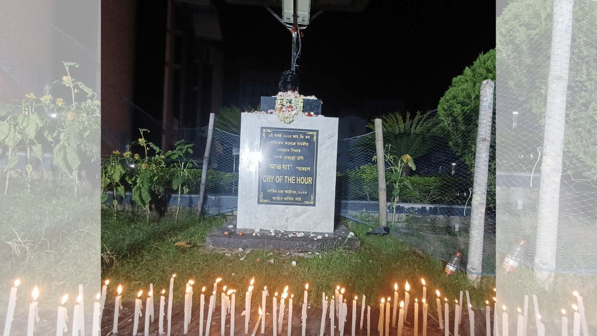 Candles lit near the bust, 'Cry of the Hour', after protesters were allowed entry inside RG Kar campus on 9 June | Priyadarshini Basu | ThePrint 