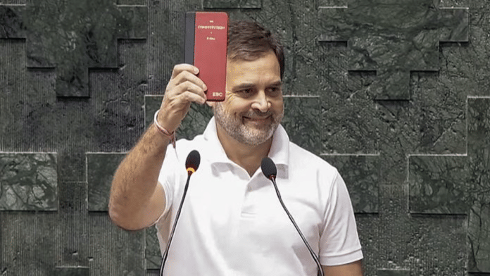 File photo of Congress MP Rahul Gandhi with a copy of the Constitution while taking oath as Lok Sabha MP | ANI Photo/SansadTV