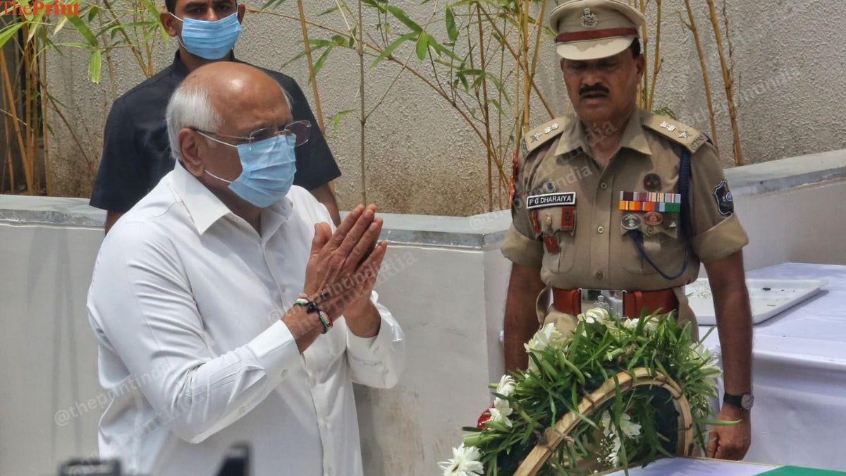 Gujarat CM Bhupendra Patel pays tribute to the former CM at Ahmedabad Civil Hospital, Monday. | Praveen Jain | ThePrint