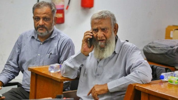 A relative of Akeel waits for his turn to give sample for DNA identification | Praveen Jain | ThePrint
