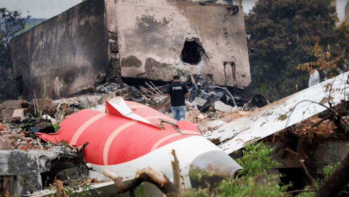 A fire officer stands next to the crashed Air India Boeing 787-8 Dreamliner aircraft, in Ahmedabad, India, June 13, 2025 | Reuters