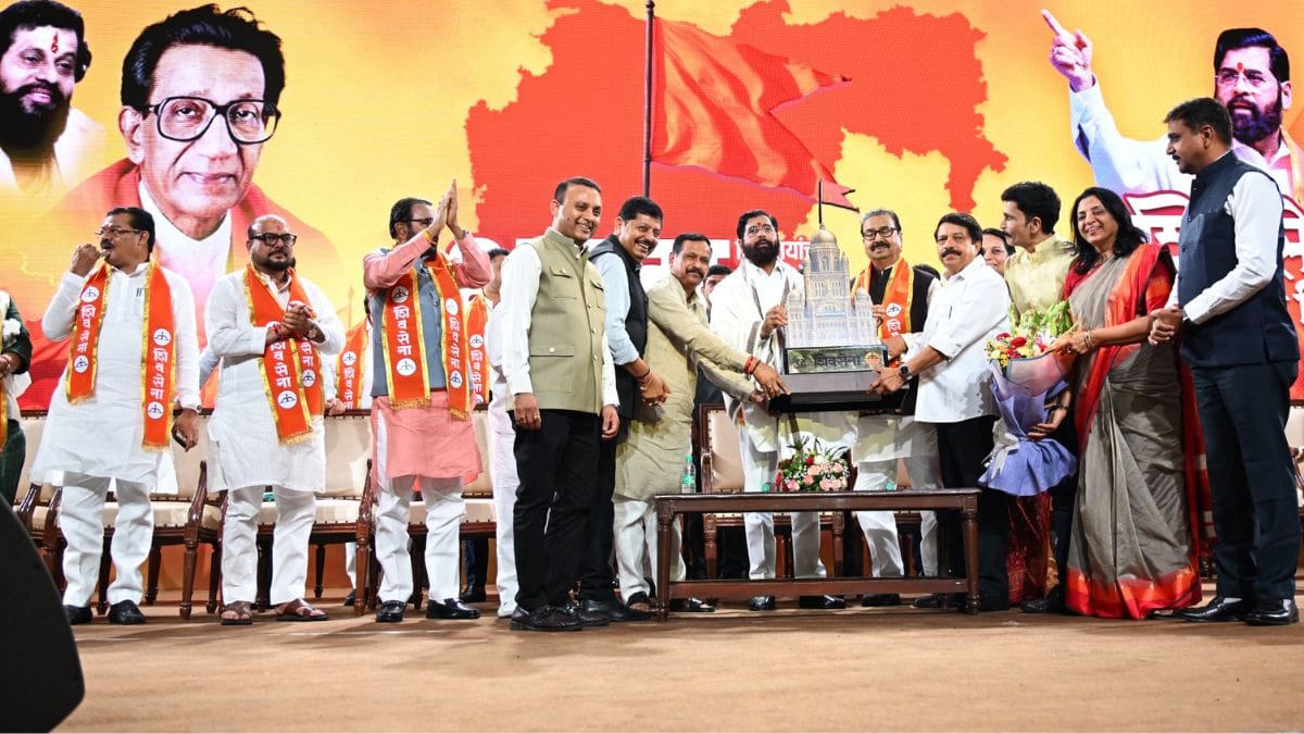 Eknath Shinde holds a small replica of the BMC headquarters | Photo: ANI
