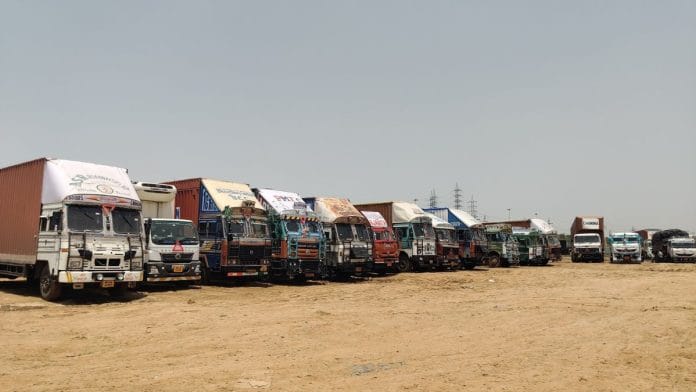 Trucks parked near NH 48 in Nuh | Shubhangi Misra, ThePrint
