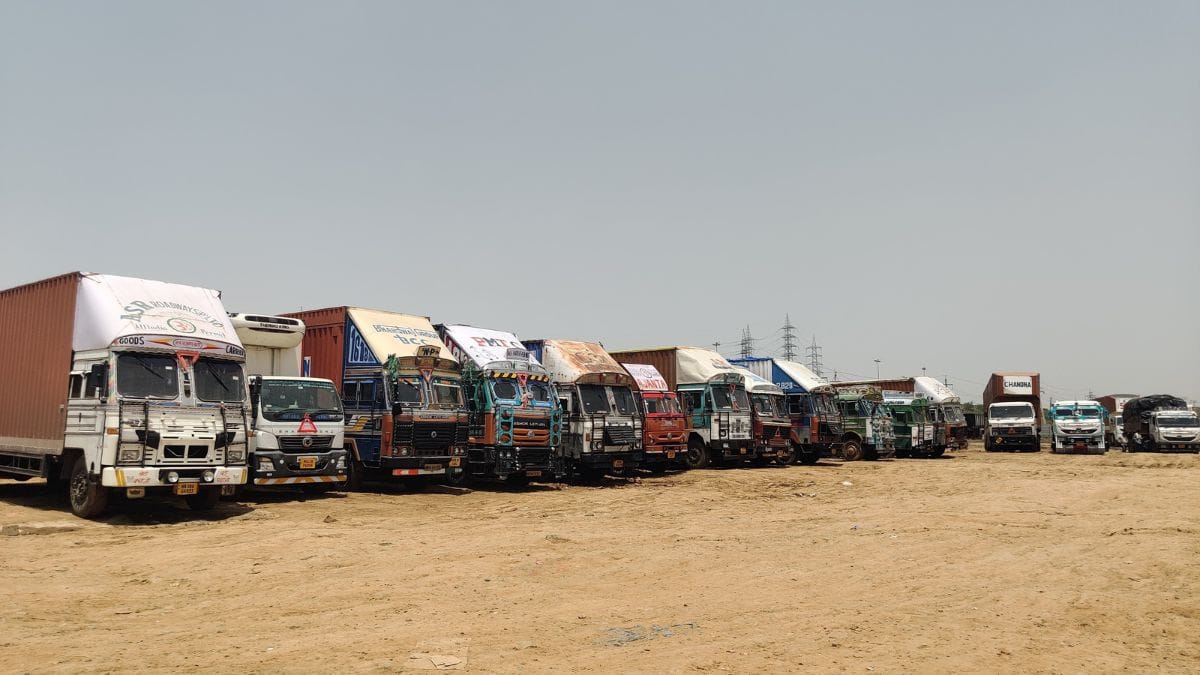 Trucks parked near NH 48 in Nuh | Shubhangi Misra, ThePrint