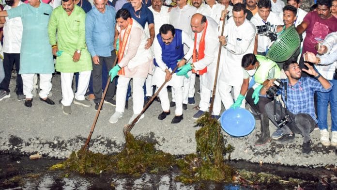 MP Mohan Yadav taking part in cleaning drive at Sangram Sagar lake during 'Jal Ganga Samvardhan Abhiyan' in Jabalpur | ANI