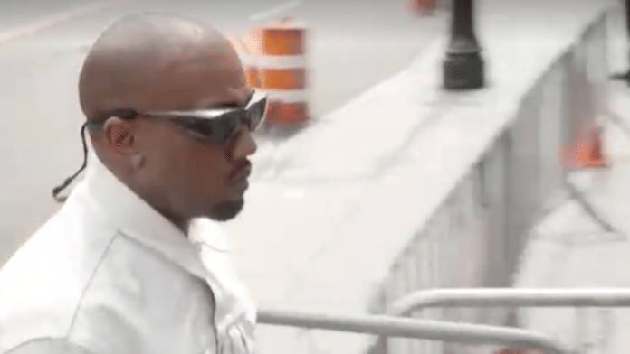 Kanye West enters the courthouse of Sean 'Diddy' Combs' trial in Manhattan. | Screenshot via Reuters