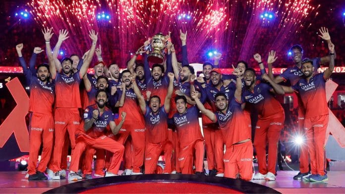 Team RCB with the IPL trophy Tuesday | X: @RCBTweets