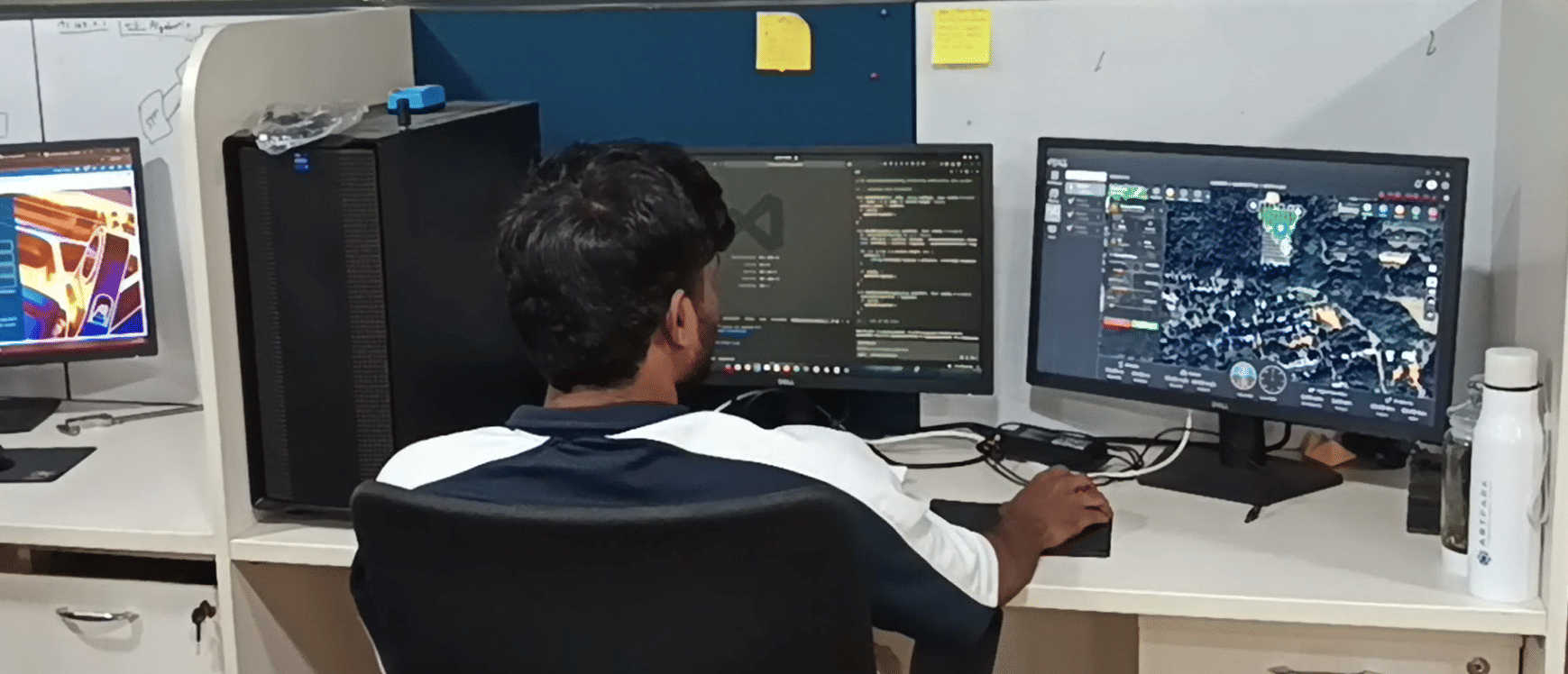 An AlgoBotix staff member simulating a drone flight at ARTGarage