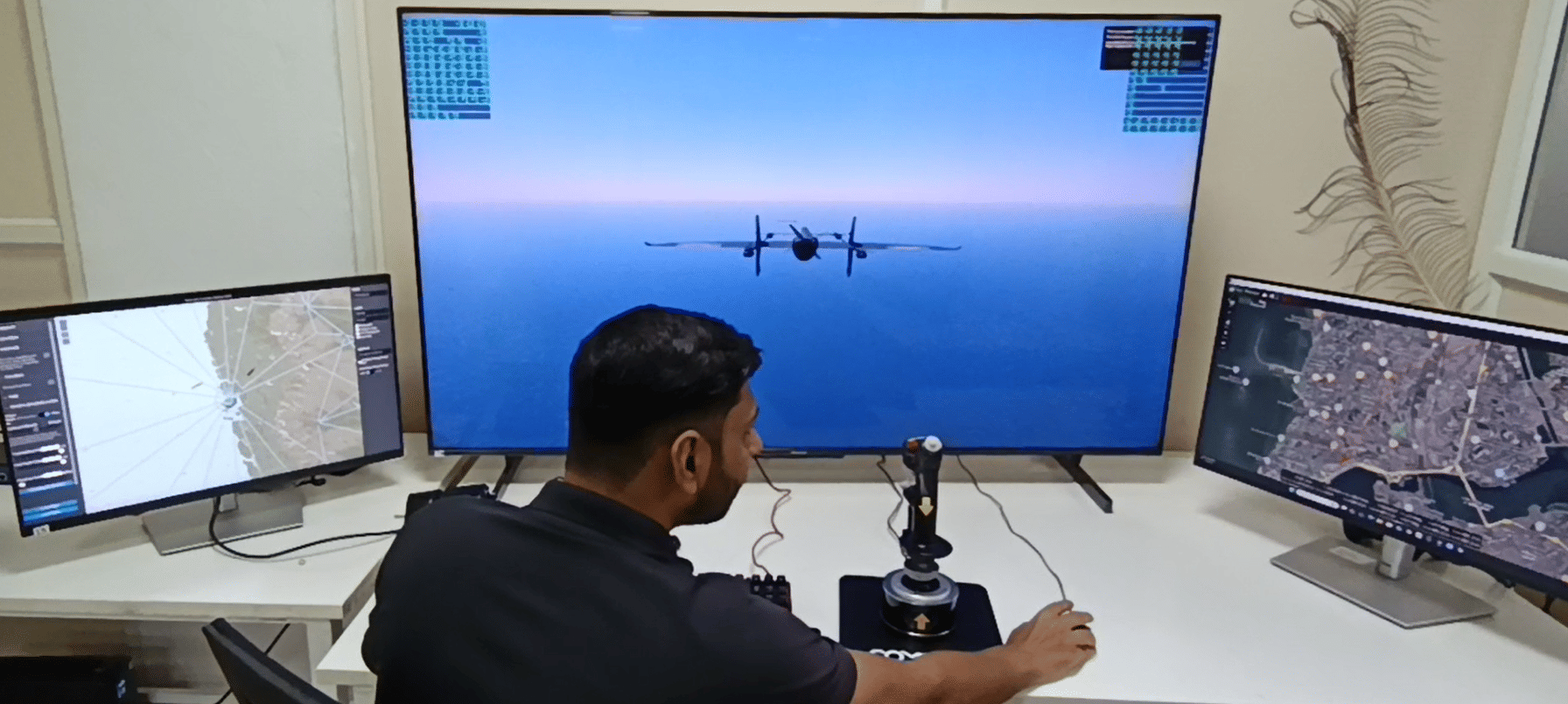 COMRADO Aerospace team at their drone simulation system installed at ARTGarage