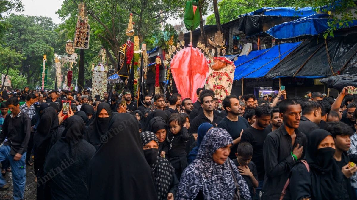 Shia Muslims take part in a Muharram procession in Dongri, Mumbai, mourning the martyrdom of Imam Hussain. Dressed in black, men, women & children walk barefoot carrying flags and taziyas. Some engage in self-flagellation to express grief and solidarity with the suffering at Karbala | Ankit Roy 