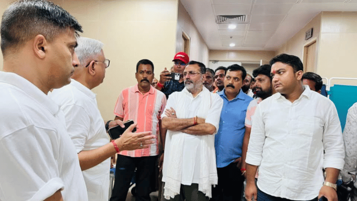 File photo of BJP MP Nishikant Dubey (arms crossed) | X/@nishikant_dubey