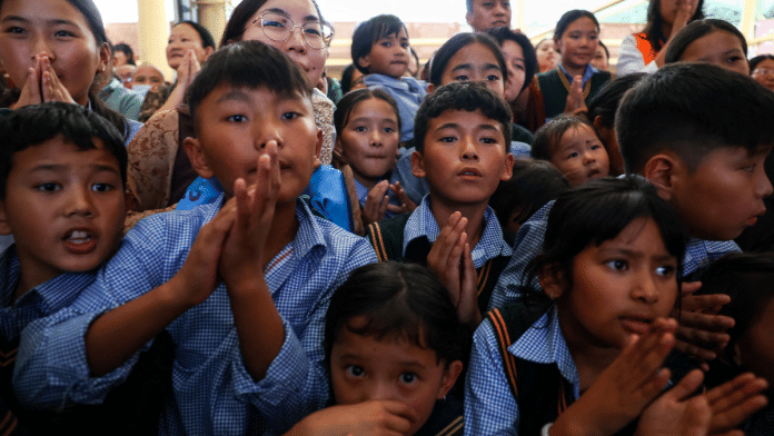 Children attend the 90th birthday of Tibetan spiritual leader, the 14th Dalai Lama, at the Tsuglagkhang, also known as the Dalai Lama Temple complex, in the northern town of Dharamshala, India, on 6 July 2025. | Anushree Fadnavis | Reuters