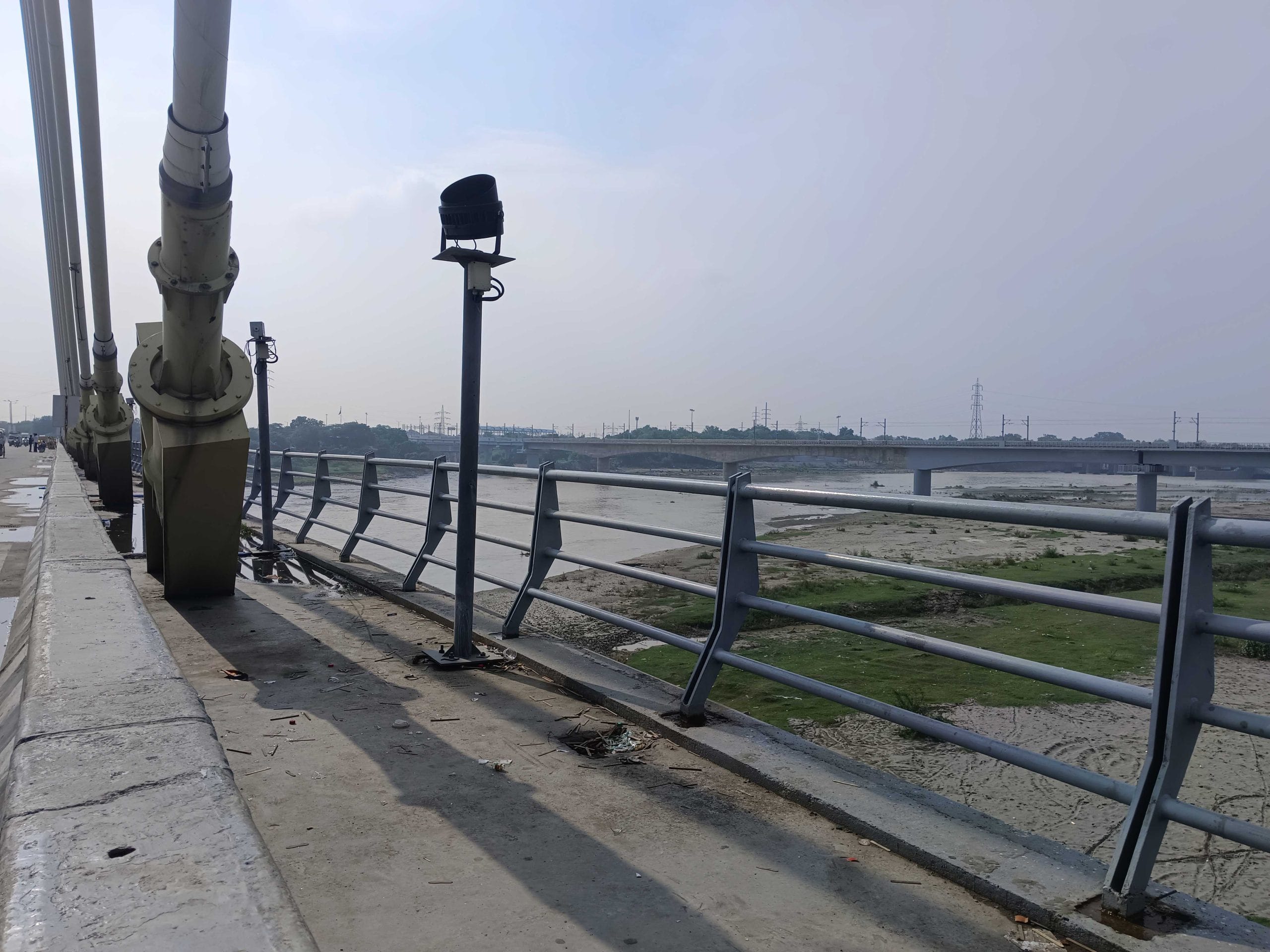 The iron barricades on the bridge are notably low in height, raising safety concerns | Almina Khatoon, ThePrint