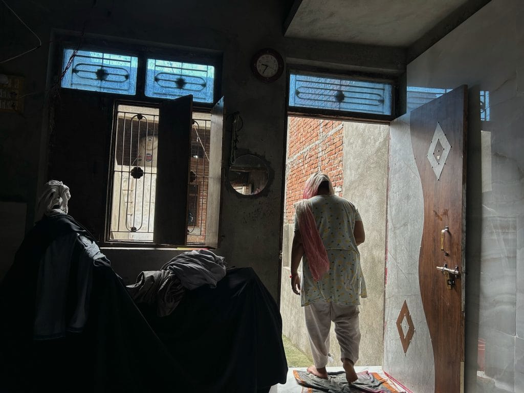 Naeema, their mother, at their one-storey house. | Manisha Mondal | ThePrint