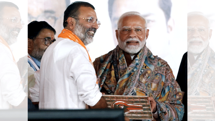 Prime Minister Narendra Modi with BJP MP Nishikant Dubey during a public meeting in Jharkhand in November 2024 | ANI file photo
