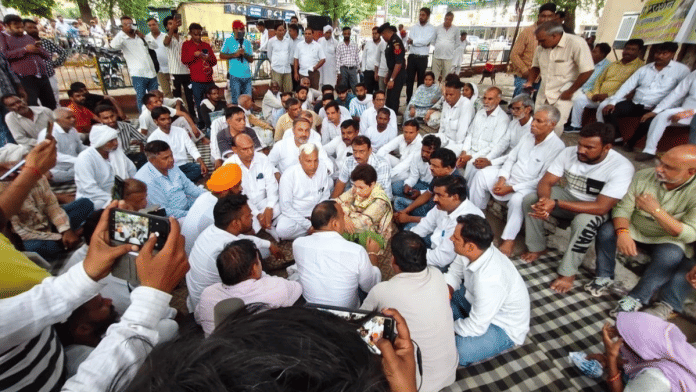 Congress MP Kumari Selja (seated in middle) with family members of Dalit teenager Ganesh Valmiki and representatives of various Dalit outfits in Hisar | X/@Kumari_Selja