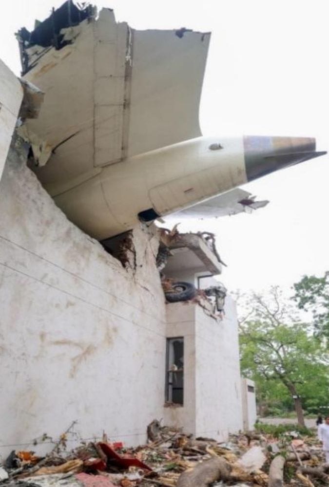 Tail section of the aircraft embedded in a building | Courtesy: AAIB