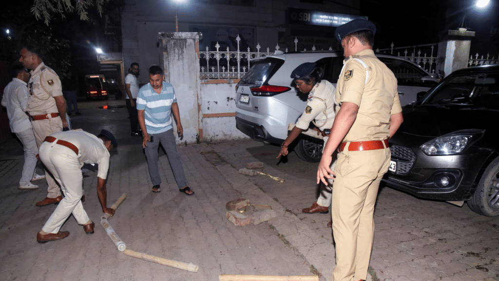 Police personnel at crime scene 4 July after businessman Gopal Khemka was shot dead near his residence in Patna | ANI