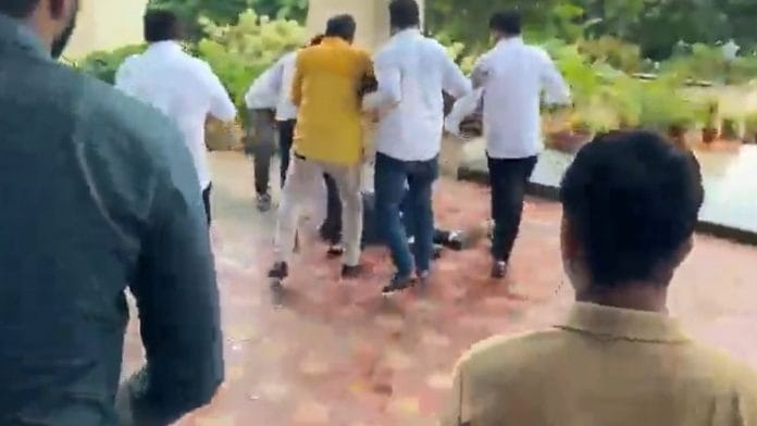 A video of Ratnakar Sahoo, OAS Additional Commissioner, BMC, being assaulted went viral online | Photo: Screen grab via X, @Naveen_Odisha