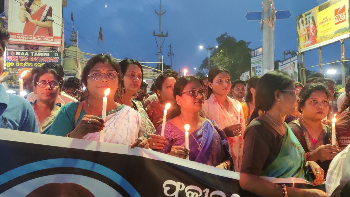 A candlelight march organized by the Balasore Municipal Corporation, attended by former MP Ravindra Kumar Jena, the block chairman, and local residents | Sakshi Mehra, ThePrint