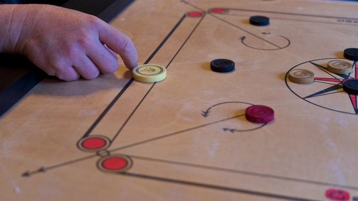 A shot in carrom, 2012