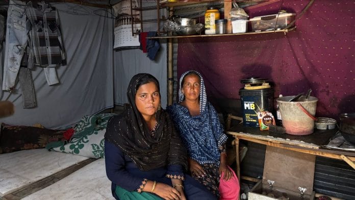 Safeera (left) and Am Bano (right) inside a jhuggi in Sector 70 after work | Samridhi Tewari, ThePrint