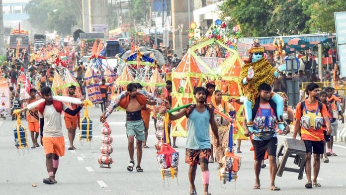 Kanwariyas return after collecting Ganga water from Haridwar during the Kanwar Yatra, in Meerut on Friday | Representational image | ANI