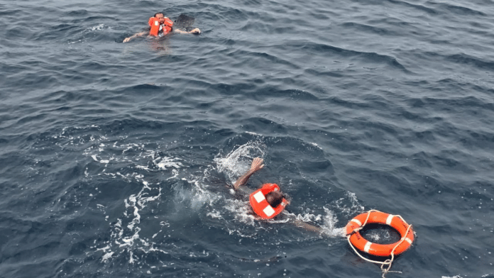 Crew members said to be from cargo ship Eternity C, which sank after being attacked, are seen at sea during a rescue operation, off Yemen, in this handout image released on July 9, 2025 | Diaplous/Handout via Reuters