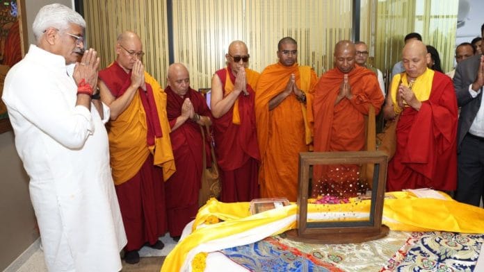 Minister of Culture Gajendra Singh Shekhawat and Buddhist monks surround the Piprahwa Gems | X/@narendramodi