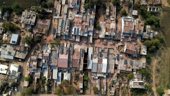An aerial view of 183.27 kilowatt solar on-grid systems installed under Pradhan Mantri Surya Ghar Free Electricity Scheme at Suki village in Kheda | ANI