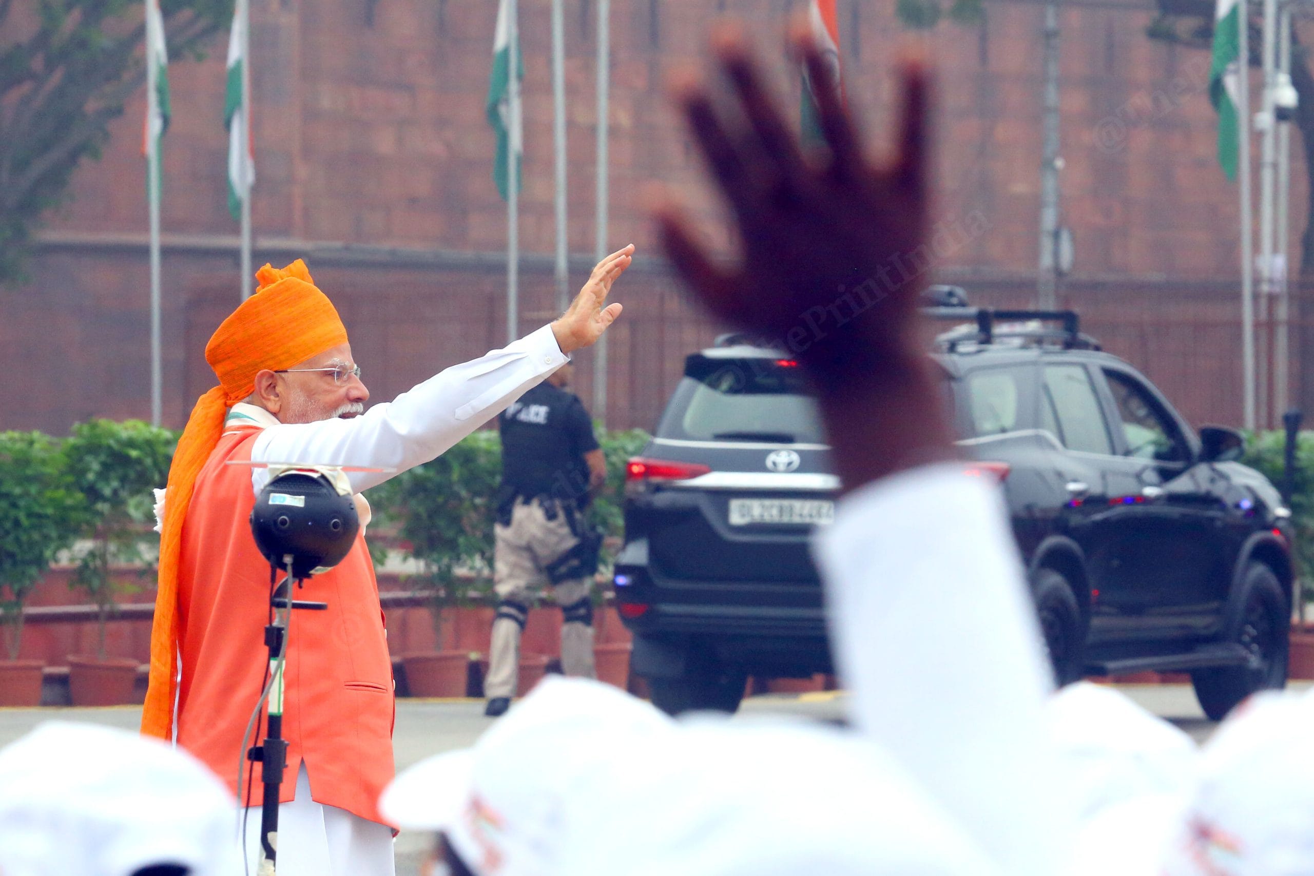 Modi waving to the crowd gathered at Red Fort after delivering his marathon speech | Praveen Jain | ThePrint