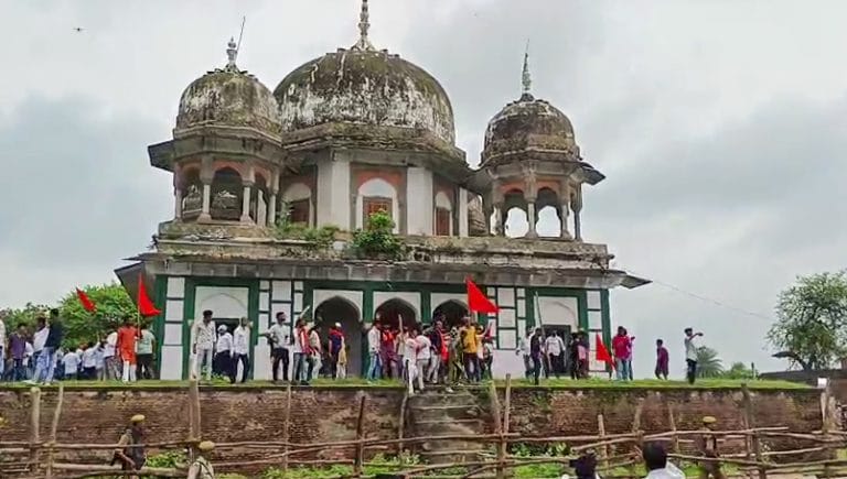 Uproar in UP assembly after videos show mob with saffron flags defacing Muslim tomb in Fatehpur