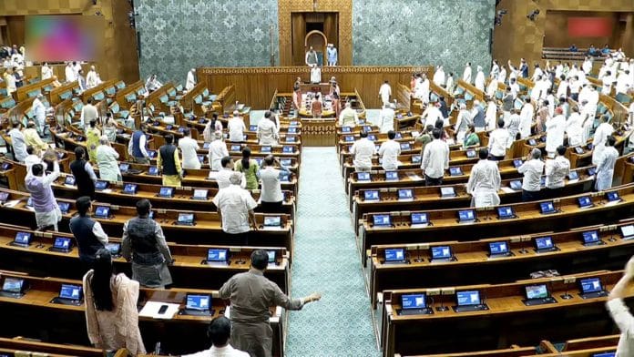 Opposition MPs create a ruckus in the Lok Sabha Wednesday, the day the amendment bill was introduced | ANI video grab