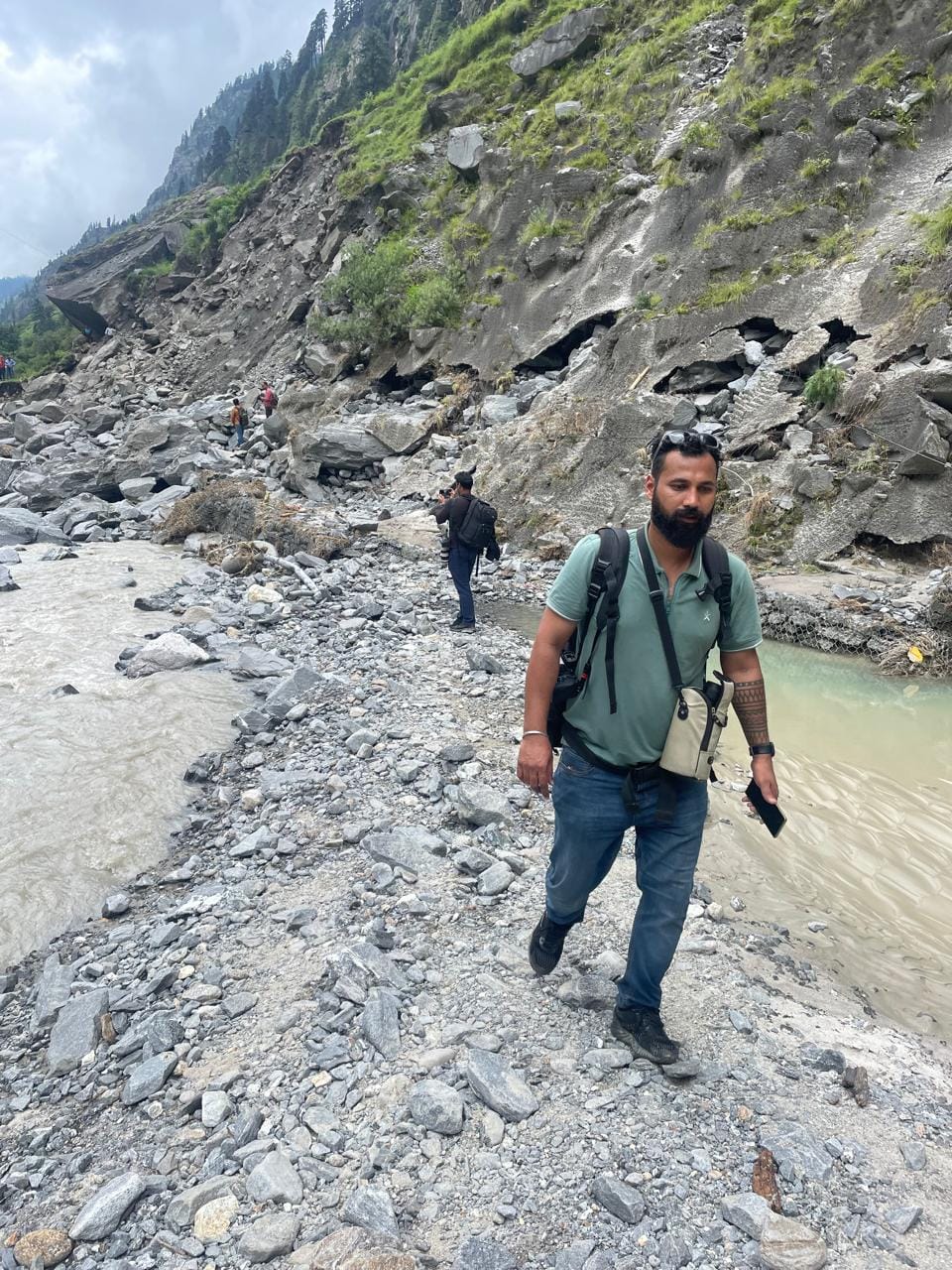 Sr Photojournalist Suraj Singh Bisht walking near the Bhagirathi river | Photo: Udit Hinduja | ThePrint