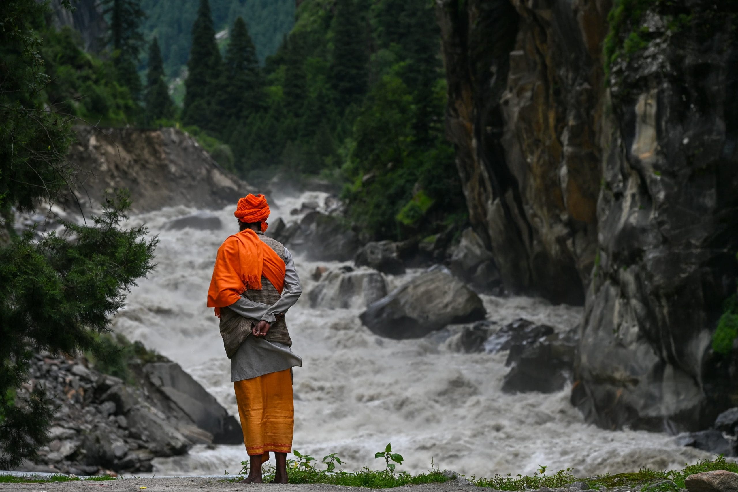 A sadhu standing near the Bhagirathi river Photo: Suraj Singh Bisht | ThePrint