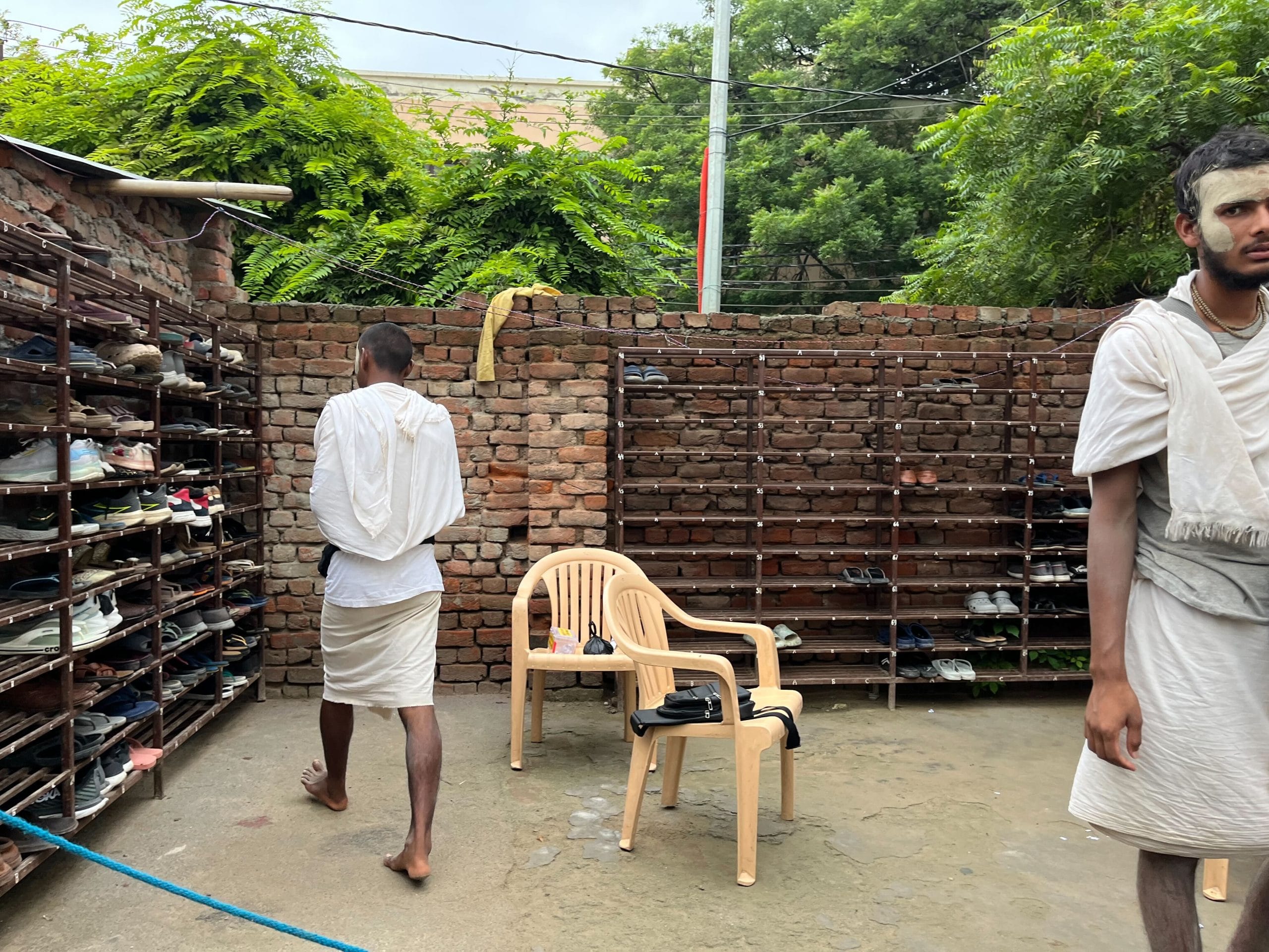 Devotees are required to remove their shoes before entering the ashram | Photo: Nootan Sharma