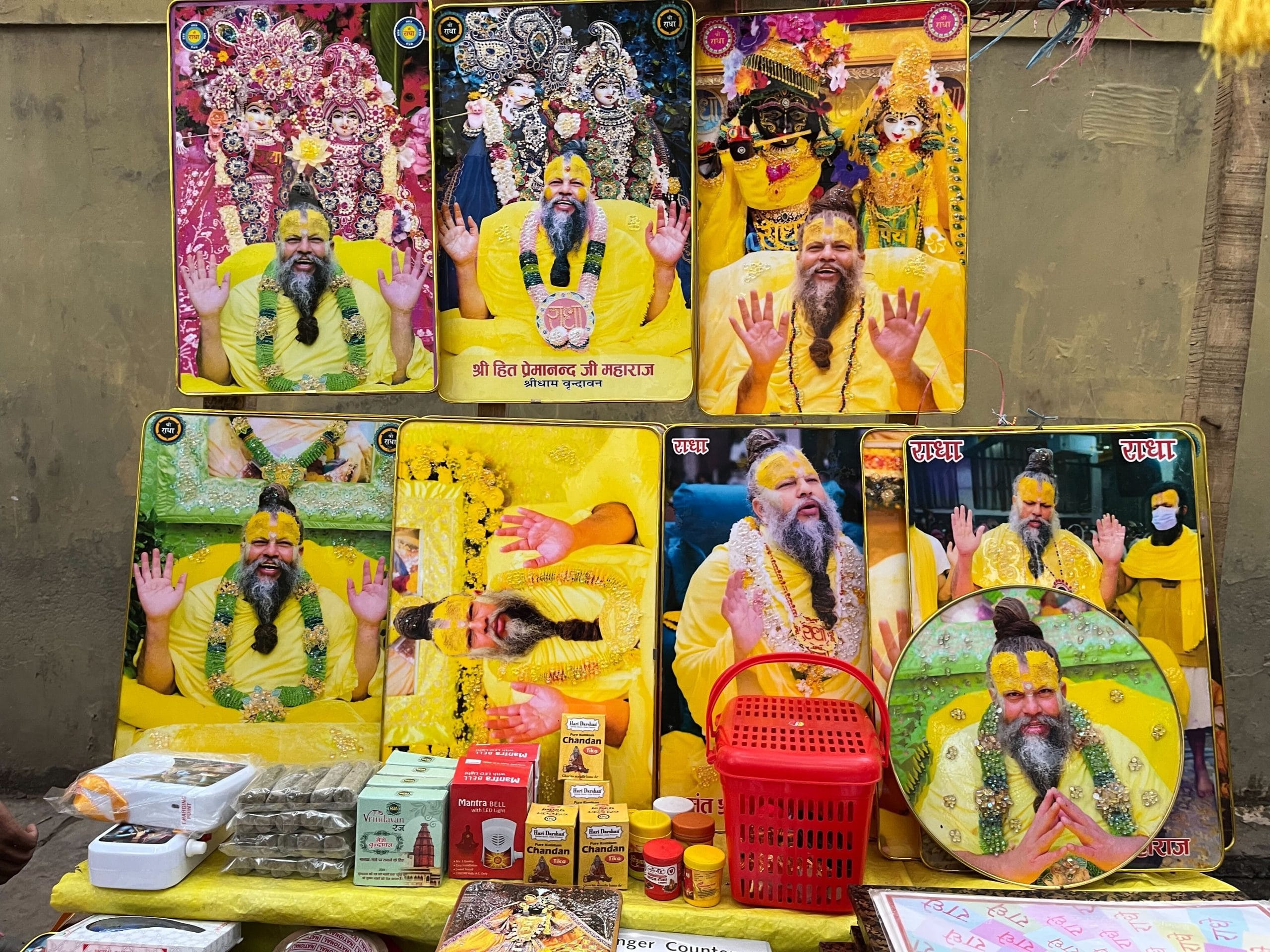 A stall selling Premanand’s photos, poster and jaap counter.