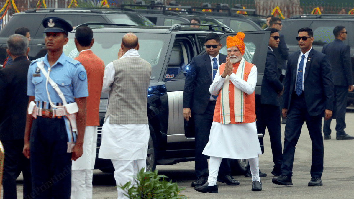 Defence Minister Rajnath Singh greets Modi upon his arrival at Red Fort | Praveen Jain | ThePrint