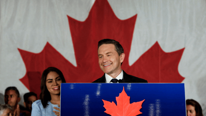Canada's federal Conservative leader Pierre Poilievre takes the podium after winning a by-election on 18 Aug, 2025 | Reuters