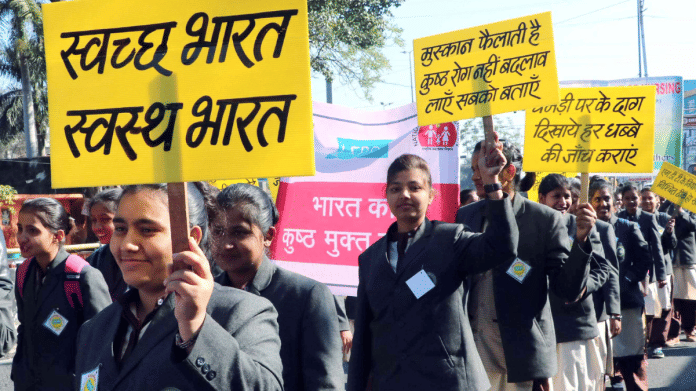 Representational image. File photo of students holding placards as they participate in rally during anti-leprosy fortnight in Bhopal | ANI file