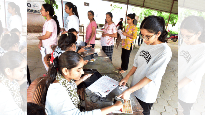 Representational image. A student undergoes biometric check at an examination centre. | ANI