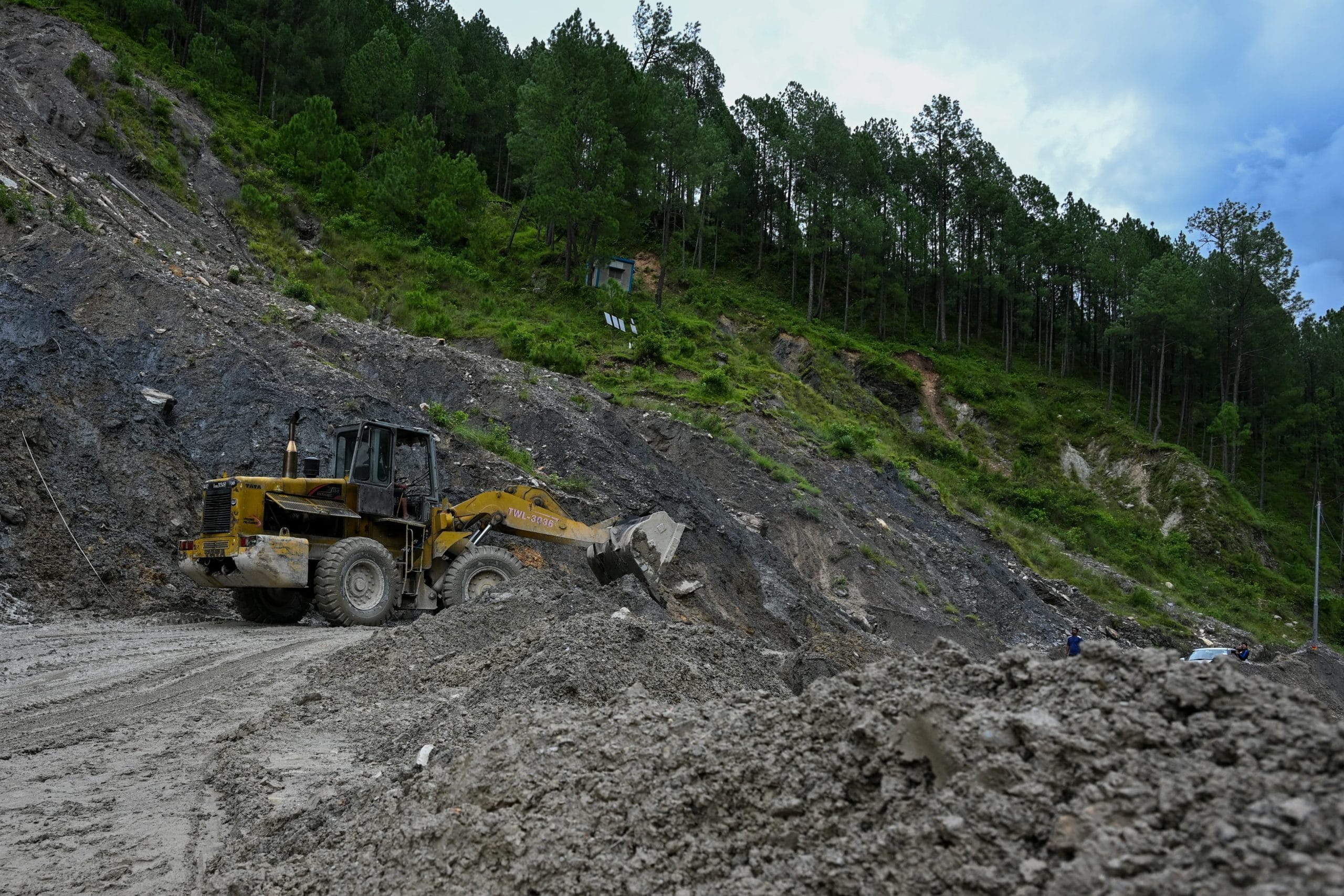 Bulldozers used to create make shift roads | Photo: Suraj Singh Bisht | ThePrint