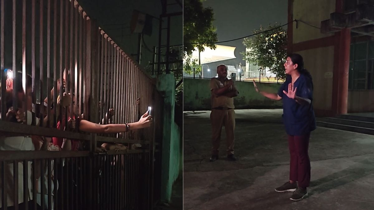 Ayesha Christina Benn, whose NGO Neighbourhood Woof is empanelled with MCD to carry out sterilisations, speaks to the crowd as they demand to know what she observed inside the Rohini centre | Gitanjali Das | ThePrint